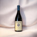 Bottle of Pegasus Bay Pinot Noir with a white fabric background