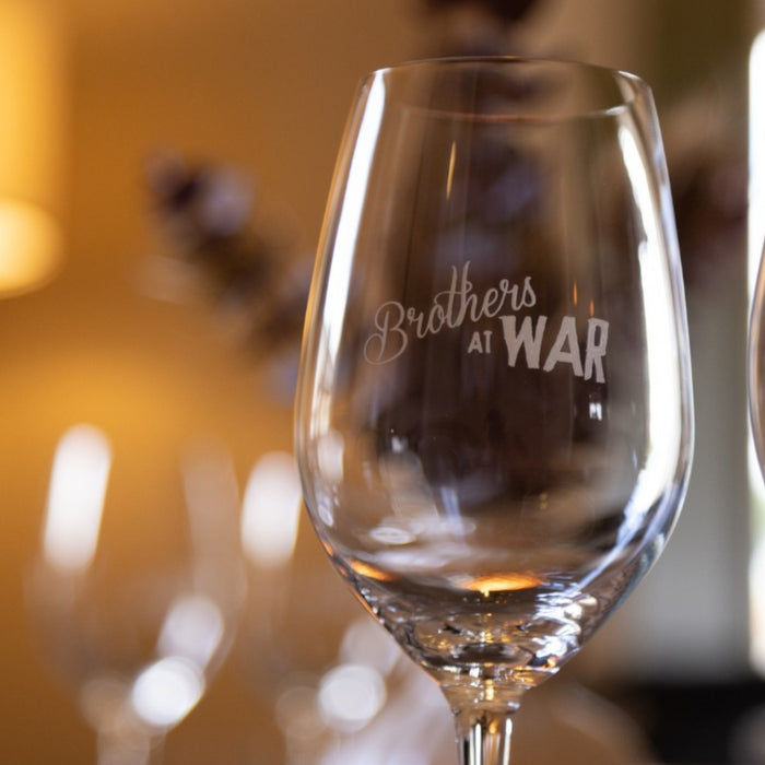 Brothers at war wine glass