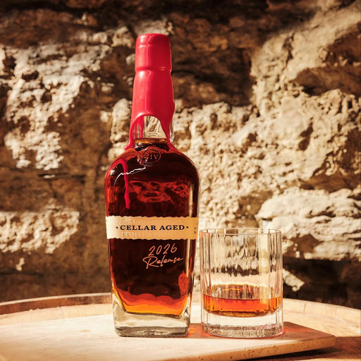 Bottle Of Maker's Mark Cellar Aged Bourbon 2026 & A Glass Served Neat
