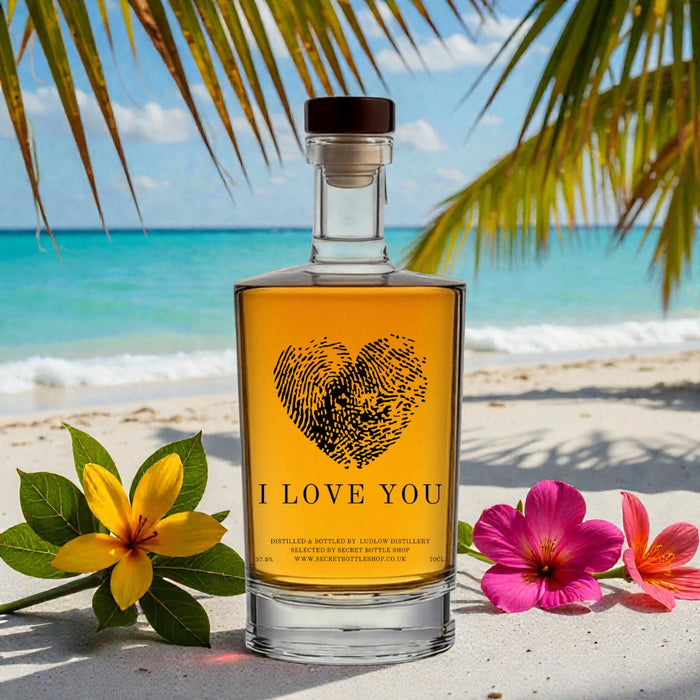 Secret Bottle Shop I Love You Engraved Rum on a beach