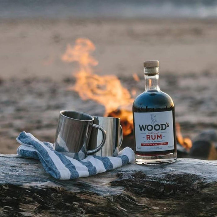 Enjoying Woods 100 Navy Rum On The Beach