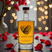 Secret Bottle Shop I Love You Engraved Rum with rose petals and heart lights.