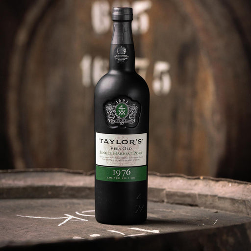 Taylor's Very Old Single Harvest Port With Oak Barrels In A Wine Cellar