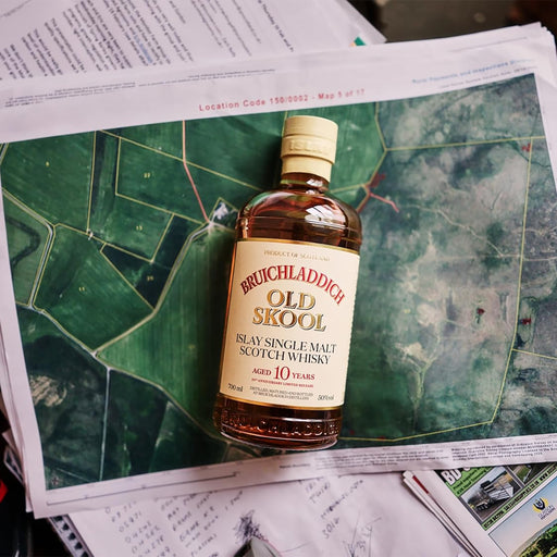Brutchladdich Old Skool whisky bottle on top of a map