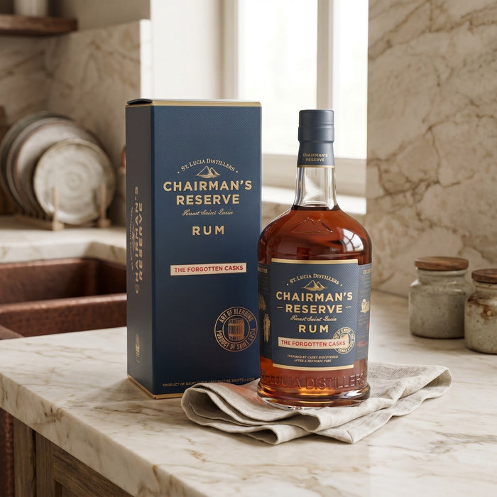 Chairman's Reserve Rum bottle and box on a marble surface with kitchen background