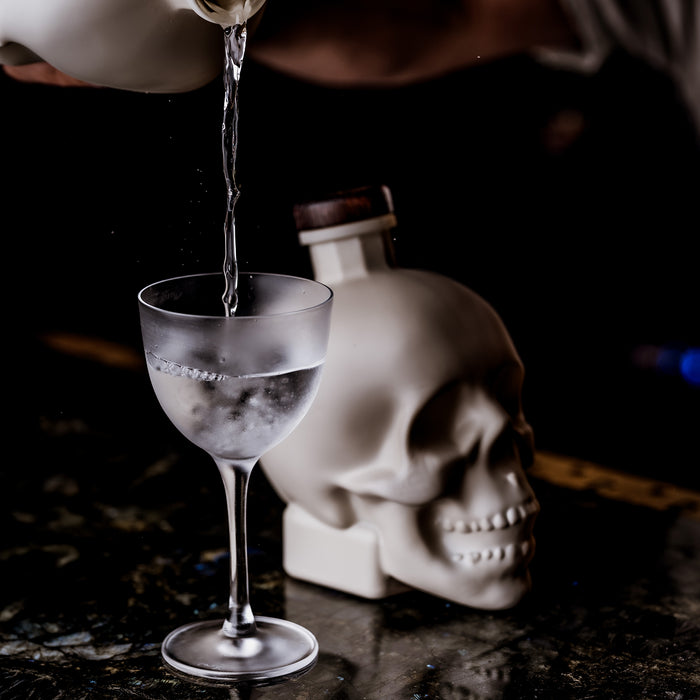 Pouring Crystal Head Bone Vodka Into A Glass