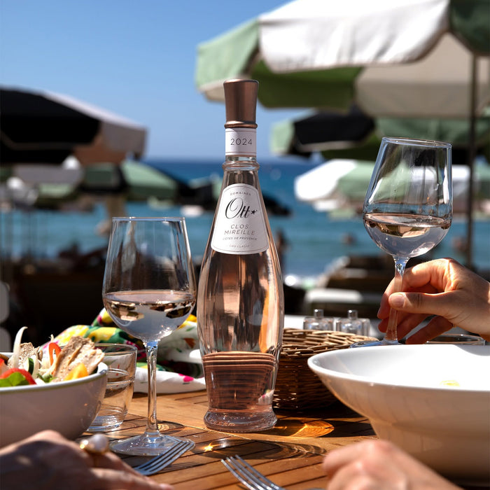 Friends Enjoying Domaines Ott Clos Mireille Provence Rose Wine With Food Near The Sea
