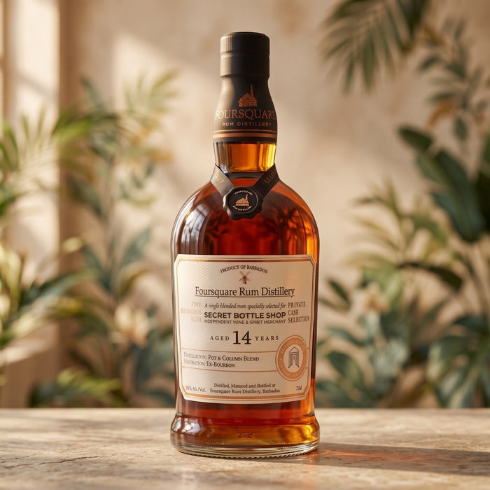 A bottle of Foursquare Rum Distillery Secret Bottle Shop 1751, 14 Years Old, filled with amber liquor, set on a wooden table with a warm, blurred background of plants and light.