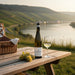 Gunderloch Roter Hang Erste Lage Nierstein Riesling with a glass of wine and grapes