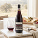 Idlewild Lost Hills Ranch Dolcetto in a home setting with cheese, tapas and a glass of red wine
