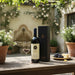 Sassicaia Tenuta San Guido 2018 Gift Boxed on a table in the garden with red wine and cheese