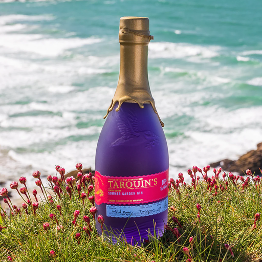 Bottle of Tarquins Summer Garden Gin On a sea cliff