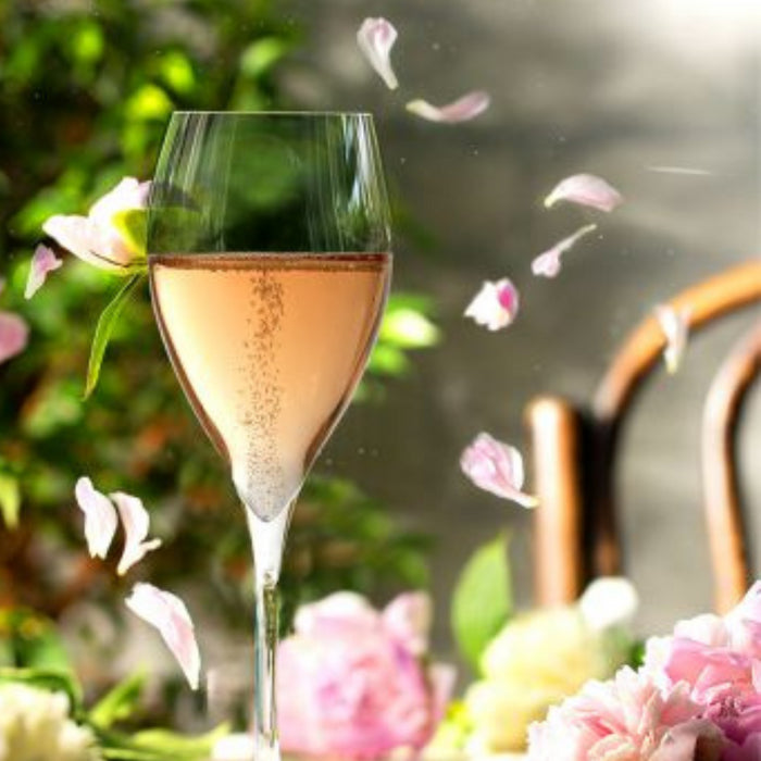 A glass of Sparkling brut rose