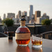 Blantons Original Single Barrel Bourbon with a glass.