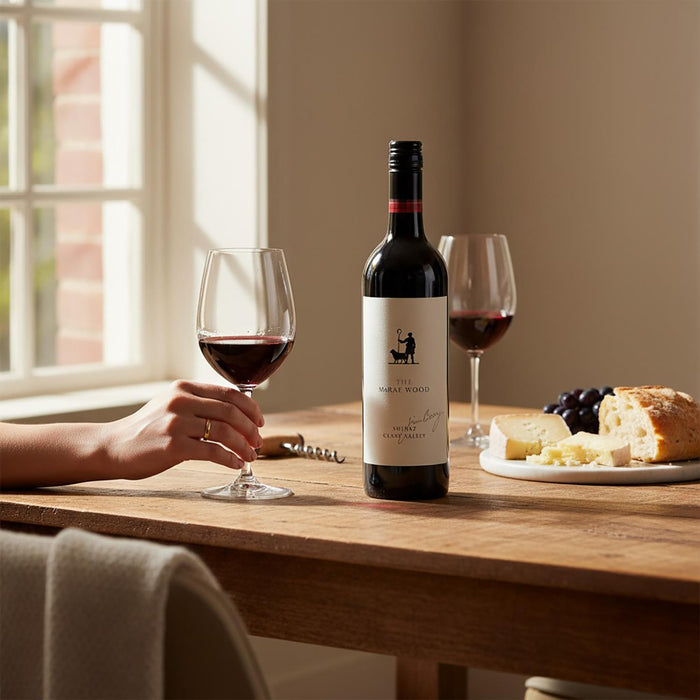 Two Glasses & Bottle Of Jim Barry The McRae Wood Shiraz With Food