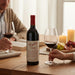 Couple Enjoying Penfolds Grange Bin 95 With Food