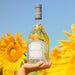 Bottle of Roseblood against a background of sunflowers