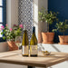 Mediterranean White Wine Discovery Duo with olives and glass of wine