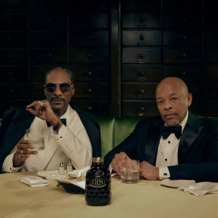 Snoop Dogg and Dr Dre with a bottle of Still G.I.N. Gin By Dr. Dre & Snoop Dogg