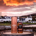Jura 10 Year Old Whisky 70c and Gift box in front of landscape 