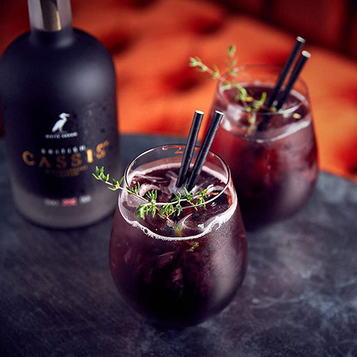 British Cassis Blackcurrant Liqueur And Two Cocktails