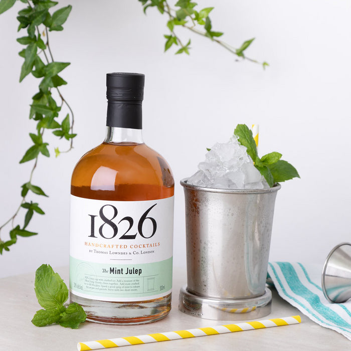 bottle of 1826 mint julep with a cocktail and a straw